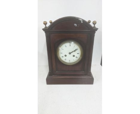 A late 19th century mahogany 8-day mantel clock with floral pierced decorationLocation: 5.1If there is no condition report sh
