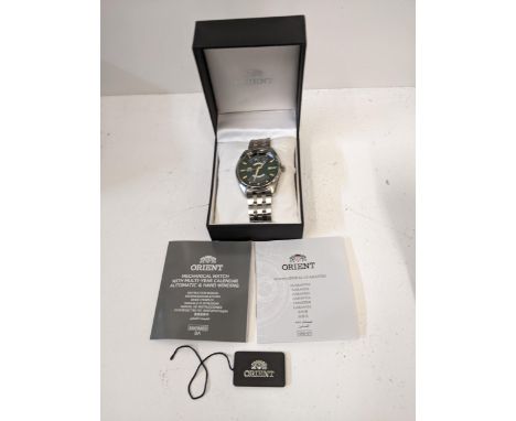 A boxed Orient mechanical gents wristwatch with multi-year calendar automatic and manual winding with manual and guarantee bo