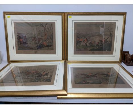 A group of four framed and glazed hunting prints 'The Grand Leicestershire Fox Hunt' and 'The Fox Chase' - after Alken Junior