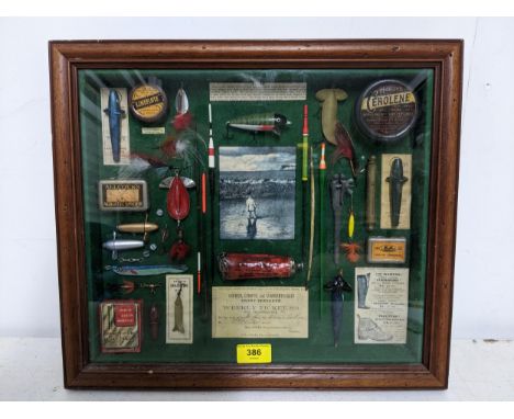 A contemporary montage of vintage fishing equipment to include tins, floats, a weekly ticket for trout fishing, and other ite