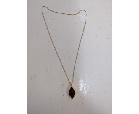 A 14ct gold pendant set with an opal doublet on a 14ct gold chain, chain weight 5.7g, total weight 14.3gLocation: C3If there 