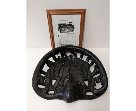 A Blacks Stove & Company Ltd tractor seat, along with a framed Caterpillar Tractors Ltd vintage advert Location: 10.5If there
