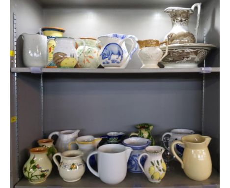 A large collection of China and ceramic jugs to include a washing bowl/basin and matching jug, two Cypriot vases and other it