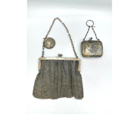 Two early 20th century silver coin purses. One silver mesh purse by Robert Chandler. French import marks. The chain link hand