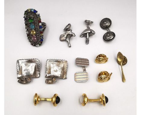 A collection of cufflinks, pins and a silver ring. Includes a pair of S.T. Dupont gold plated onyx and mother of pearl bar cu