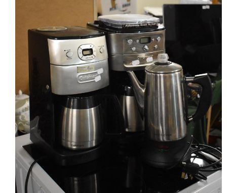 Two Coffee Making Machines and a Coffee Percolator 