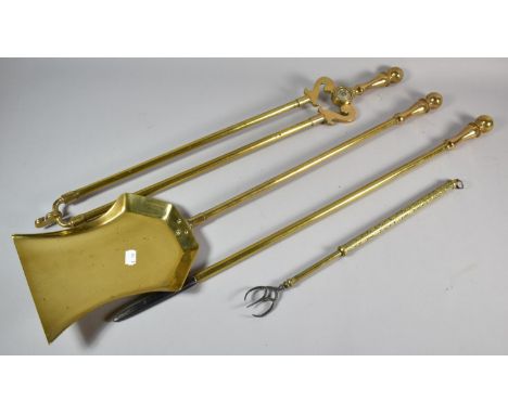 A Set of Three Long Handled Brass Fire Irons and a Retractable Brass Toasting Fork 