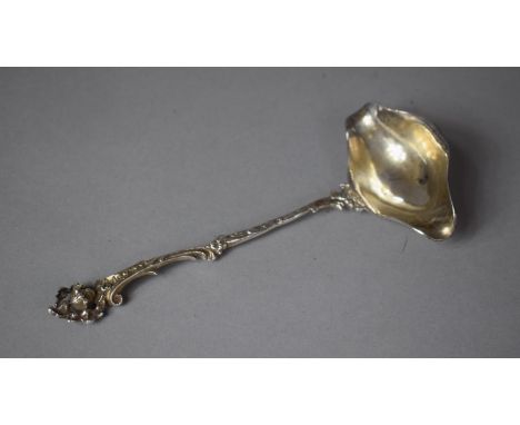 A Continental Silver Toddy Ladle Having Rococo Style Handle and Cherub Finial, 17cm long, Stamped 830 