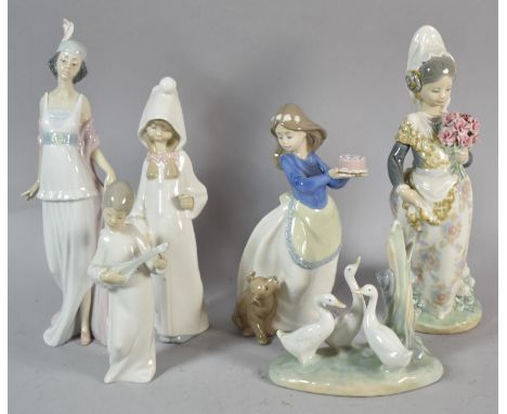 A Collection of Six Various Spanish Figural Ornaments to Include Lladro and Nao 