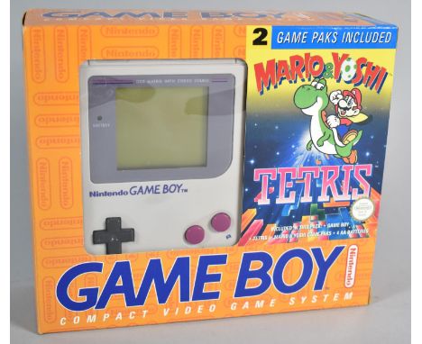 A Nintendo Game Boy Compact Video Game System with Two Games, Mario and Yoshi and Tetris 