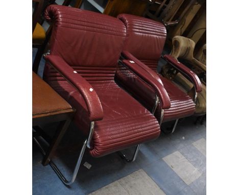 A Pair of Vintage Chrome Based Leather Upholstered "Girsberger" Open Armchairs 