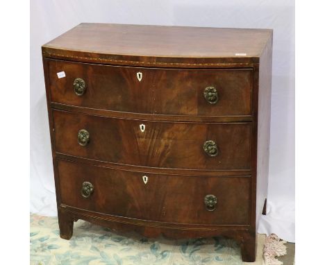 George III inlaid mahogany chest of three long drawers, bow fronted, for light restoration. Not available for in-house P&amp;