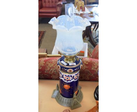 Ceramic cylindrical shaped oil lamp with glass shade   