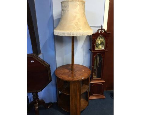 An Art Deco walnut circular lamp table