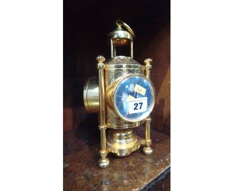 A brass desk barometer
