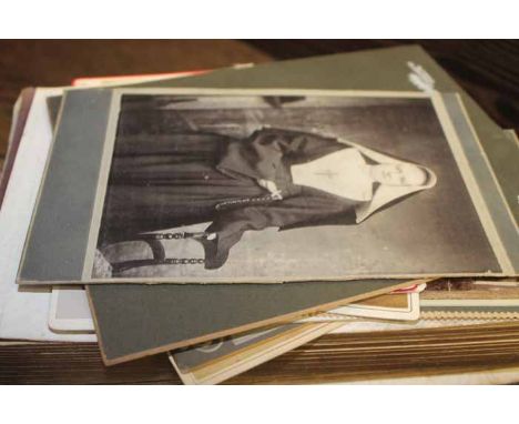 TWO ALBUMS OF VINTAGE PHOTOGRAPHS
with Victorian examples 