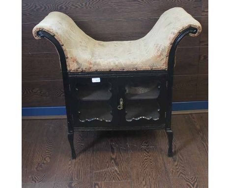 VICTORIAN EBONISED STOOL CABINET
with upholstered seat and arms with small double glazed doored cabinet below, 72cm high