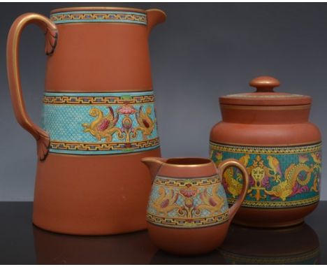 A Pratt Ware Terracotta tapering jug,  with Renaissance style enamel band, 21cm and five other items of Terracotta ware with 