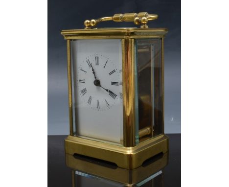French brass carriage clock, white enamel dial, platform escapement, 12cm.