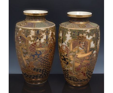 Pair of Satsuma shouldered vases, decorated with figures, in coloured enamel and gilt, 38cm.