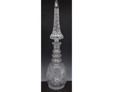 Massive cut glass decanter, pointed and faceted stopper, triple ring neck, 72cm.