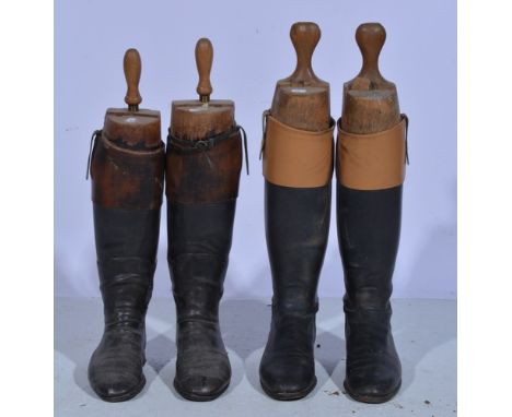 Pair of brown top, black leather riding boots, with wooden trees labelled "Tom Hill, Knightsbridge Limited", three other pair