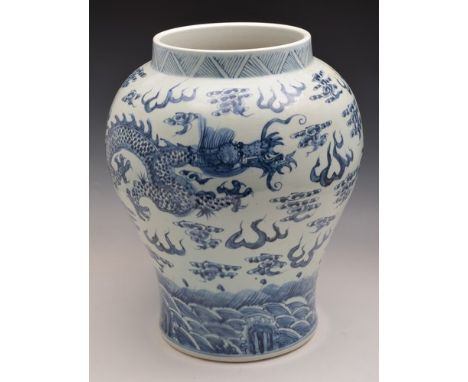 Chinese blue and white shouldered vase, decorated with a dragon chasing a flaming pearl, 45cm.