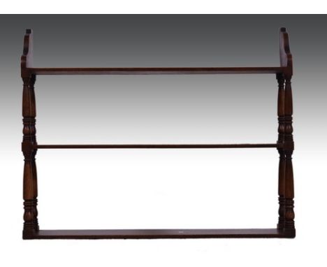 Georgian style mahogany wall shelf, three tiers, turned and ringed uprights, width 76cm.