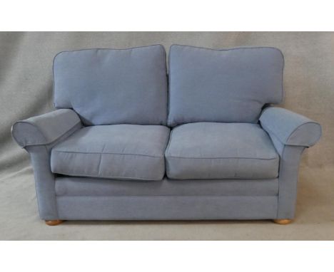 A contemporary two seater sofa bed. H.80 W.176 D.85cm (Sofa) L.177 W.113cm (Mattress) 