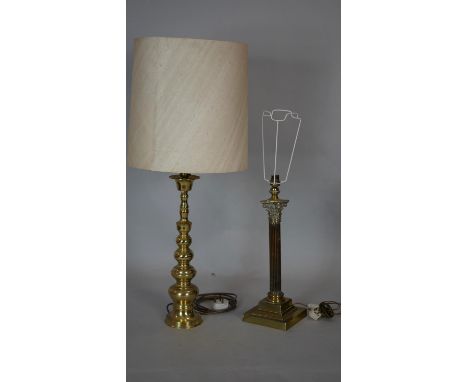 A brass Corinthian column table lamp base and an Eastern style brass table lamp and shade. H.51cm (Tallest) 