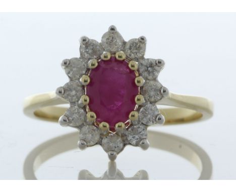 9ct Yellow Gold Oval Ruby And Diamond Ring (R0.66) 0.40 Carats - Valued By IDI £4,595.00 - An oval 7mm x 5mm peridot sit in a