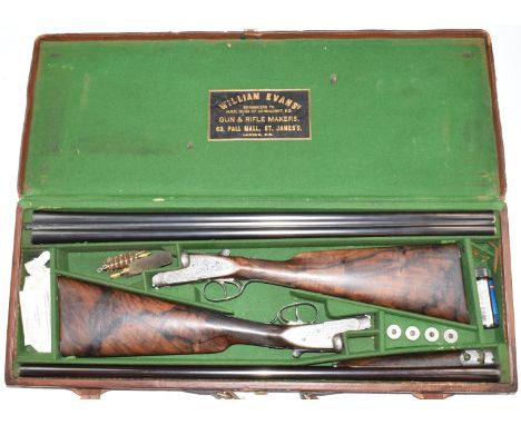 A pair of William Evans best quality 12 bore sidelock side by side ejector shotguns each with named locks, fine scrolling eng