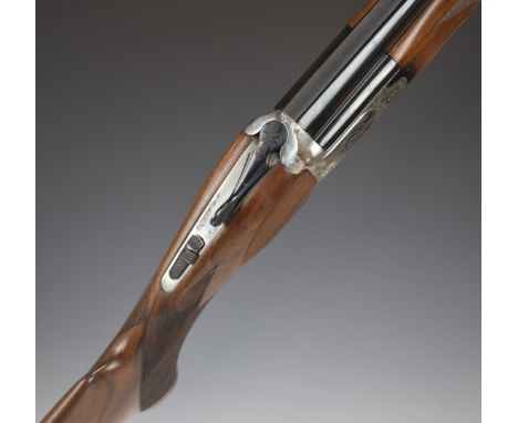 Antonio Zoli ZG12295 12 bore over and under ejector shotgun with engraved scenes of birds to the lock and underside, engraved