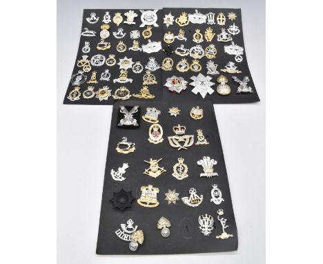 Collection of approximately eighty Staybrite badges including Royal Hussars, Royal Welsh Fusiliers, Gloucestershire Regiment,