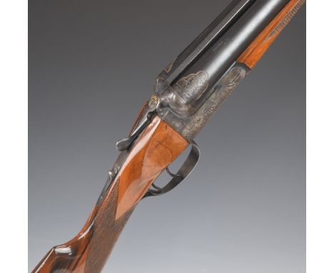 Essex 12 bore side by side shotgun with engraved scenes of dogs to the locks, engraved underside, trigger guard, fences, top 