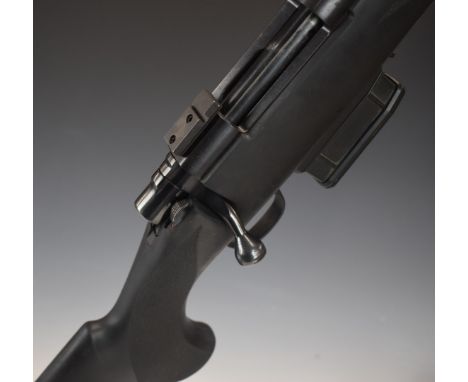 Howa Model 1500 .243 bolt action rifle with synthetic stock, textured semi-pistol grip and forend, extended magazine and 21 i