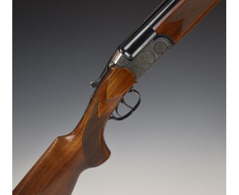 Sportarmi 12 bore over and under ejector shotgun with two sets of barrels, engraved locks, underside, top plate and thumb lev