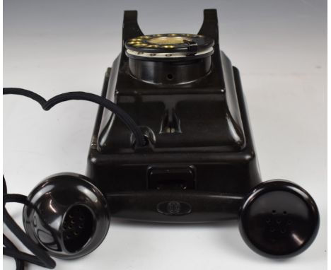 Vintage black Bakelite wall mounted telephone, numbered to back L1186 B9, possibly by Strowager