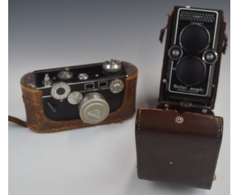 Rollei Magic TLR camera together with a vintage Argus rangefinder camera