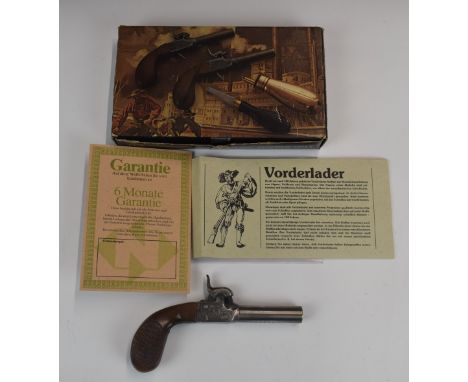 Pedersoli Derringer .44 percussion hammer action pocket pistol with engraved locks, folding trigger, chequered grips and 2.5 
