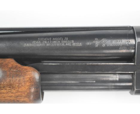 Stevens Model 79 12 bore three shot pump action shotgun with engraved scenes of birds to the locks, chequered semi-pistol gri
