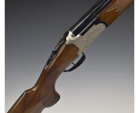 Lanber 12 bore over and under shotgun with engraved lock, trigger guard, underside and thumb lever, chequered semi-pistol gri
