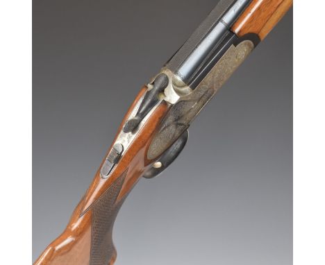 Rizzini 12 bore over and under ejector shotgun with engraved sidelock plates, trigger guard, underside, top plate and thumb l