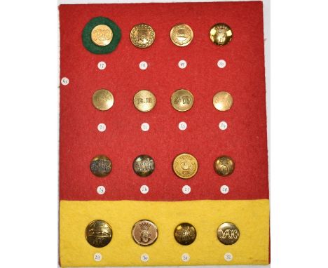 Sixteen vintage hunt/hunting buttons mounted on a felt covered display board, comprising Heythrop, Flint and Denbigh, Eglingt