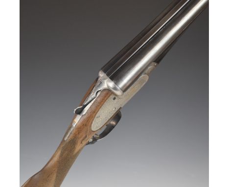 E J Churchill 12 bore sidelock side by side ejector shotgun with named and engraved locks, engraved trigger guard, underside,