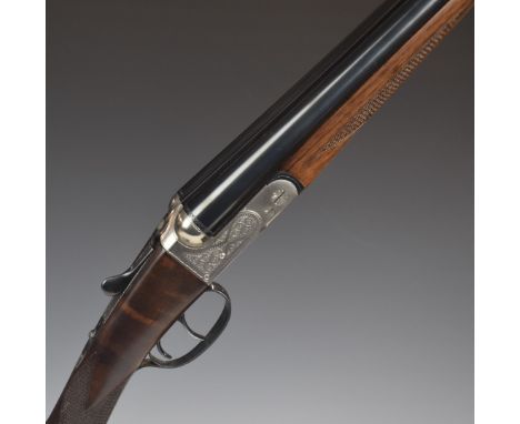 Ugarteghea 20 bore side by side ejector shotgun with engraved locks, underside, trigger guard, top plate and thumb lever, che
