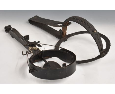 Two vintage large steel and wrought iron animal traps with circular ends, largest 53 x 25 x 18cm