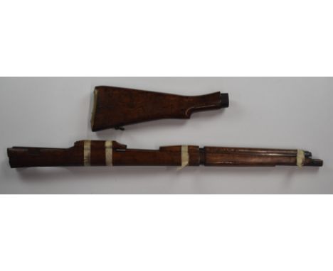 Short magazine Lee Enfield bolt-action rifle stock stamped 'TDE(W)' around ministry arrow with storage compartment to the bra