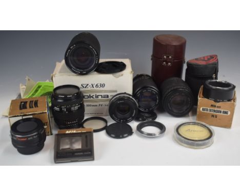 SLR camera lenses and accessories including Nikon 35-80mm 1:4-5.6D, Nikkor 50mm 1:1.8, Sigma 70-210mm 1:4-5.6, Carl Zeiss Jen