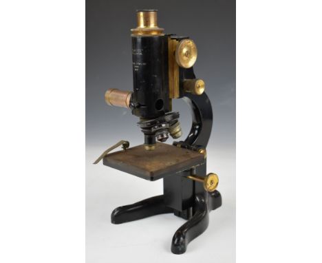 W Watson &amp; Sons 'Service' metallurgical microscope with three objective lenses, serial number on microscope 81121, marked